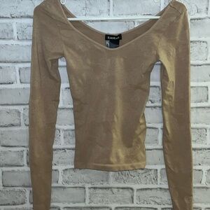 Bebe women’s nude long sleeve fitted top- faint floral print - size medium